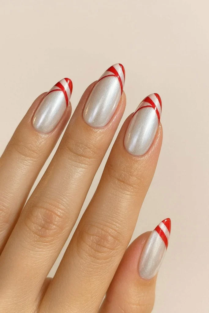 Pearl chrome candy cane French tip nails iridescent winter glow