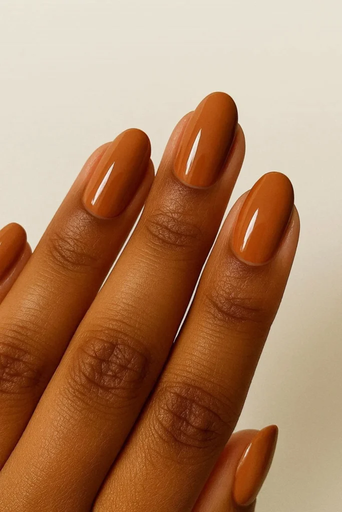  Pumpkin spice fall nails warm orange brown skin tones