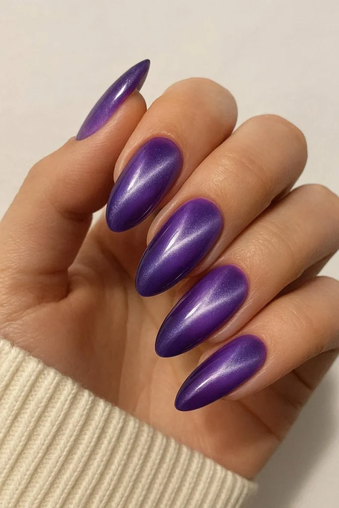  Purple aura cat eye nails with aurora shimmer on Almond shape