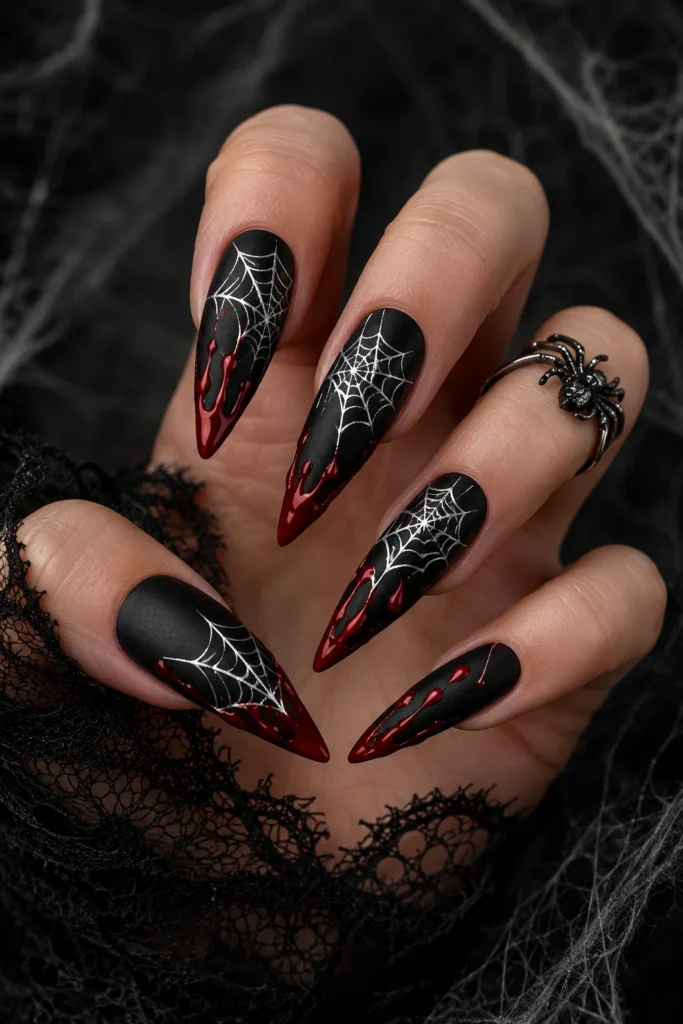 Spider web and blood drip Halloween nail art design
