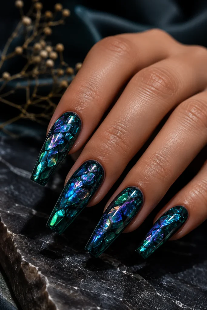 Abalone shell inspired nails with layered iridescent chrome flakes