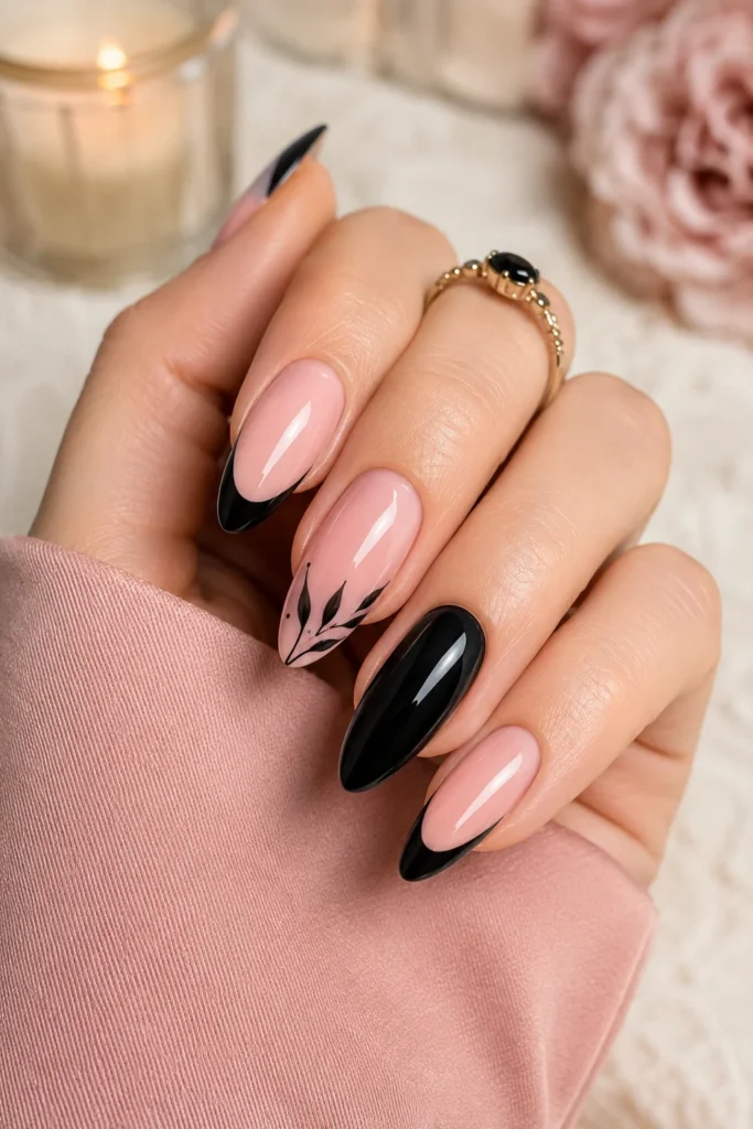 Almond shaped pink and black nail manicure