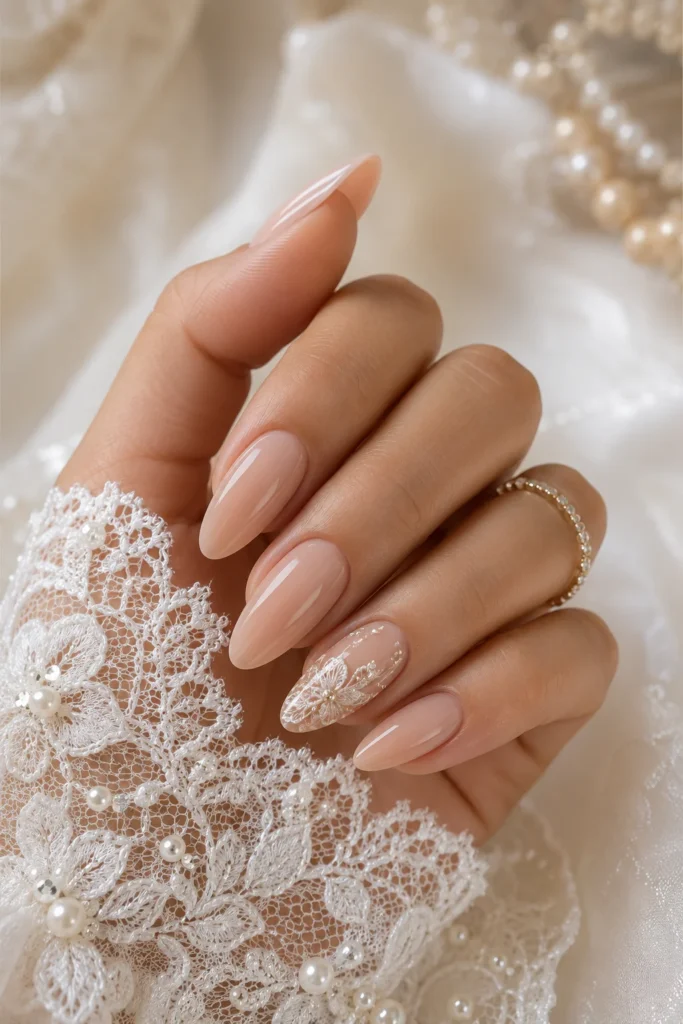 Elegant almond shaped glossy nude bridal nails