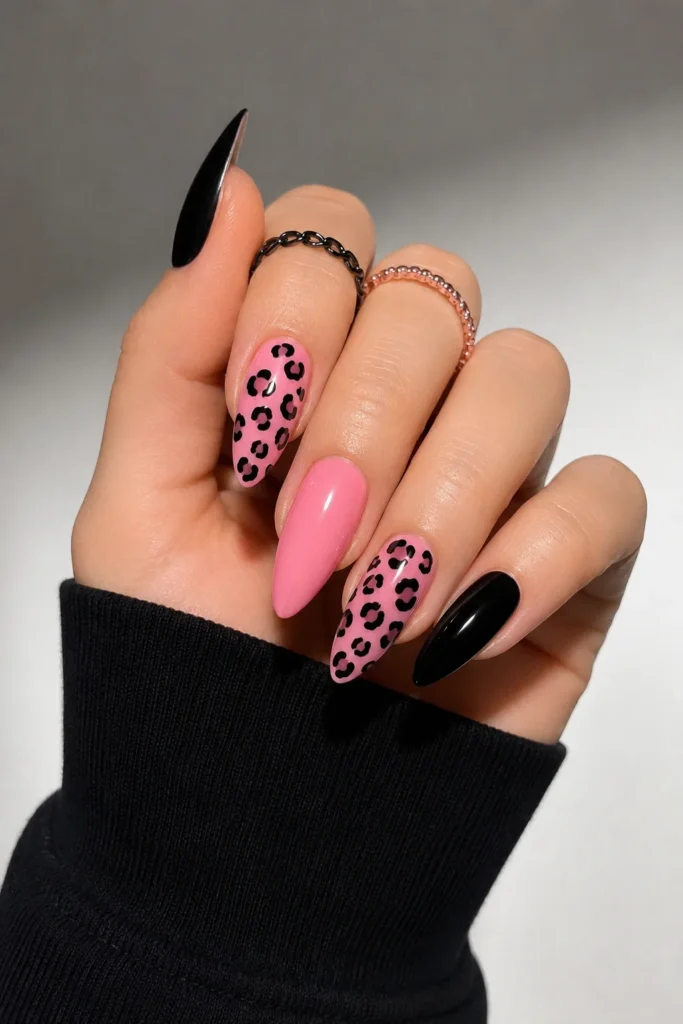 Leopard print pink and black nail art design