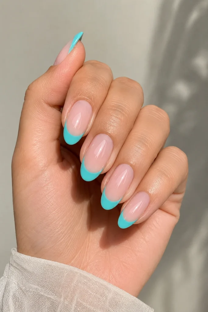 Refreshing aqua blue french tip nail design
