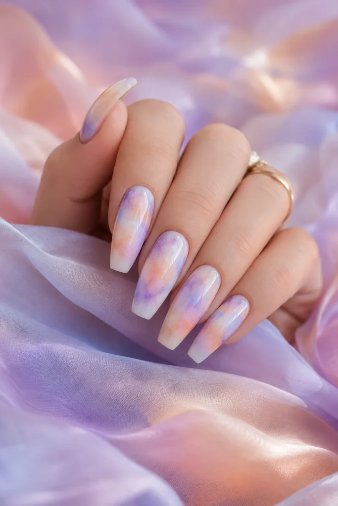 Pastel aura ballerina nails with soft color blur effect