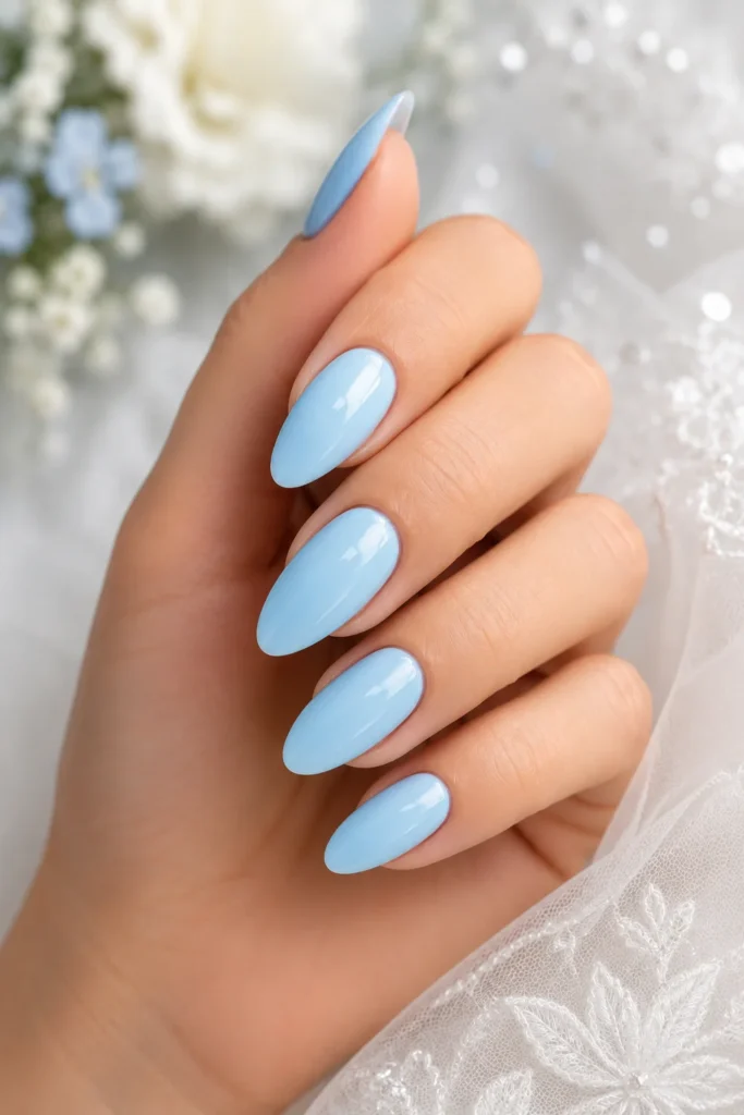 Light baby blue glossy nails for beach wedding