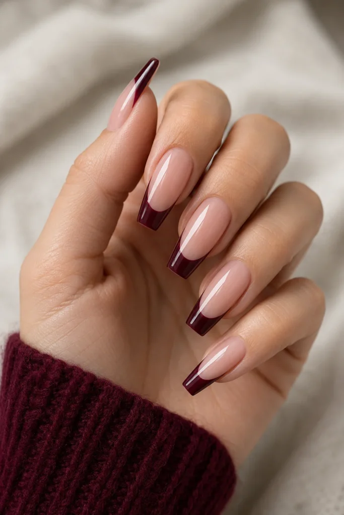 Rich burgundy French tips on coffin nails