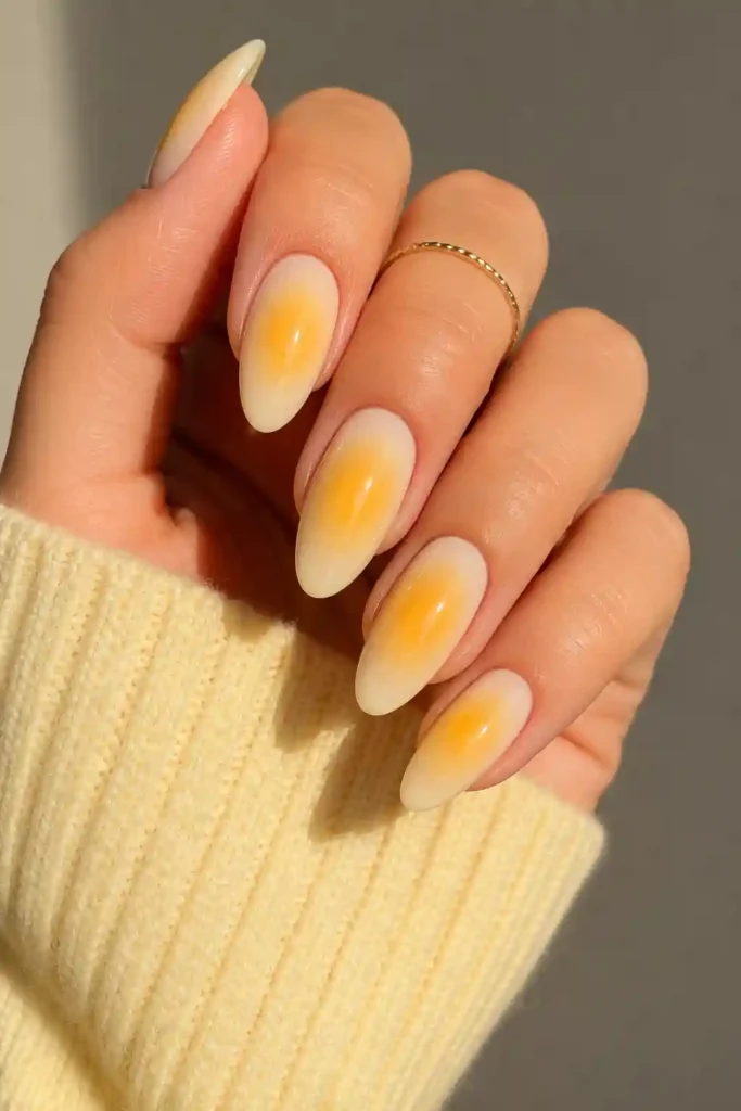 Butter yellow aura nails with cheerful sunshine center glow