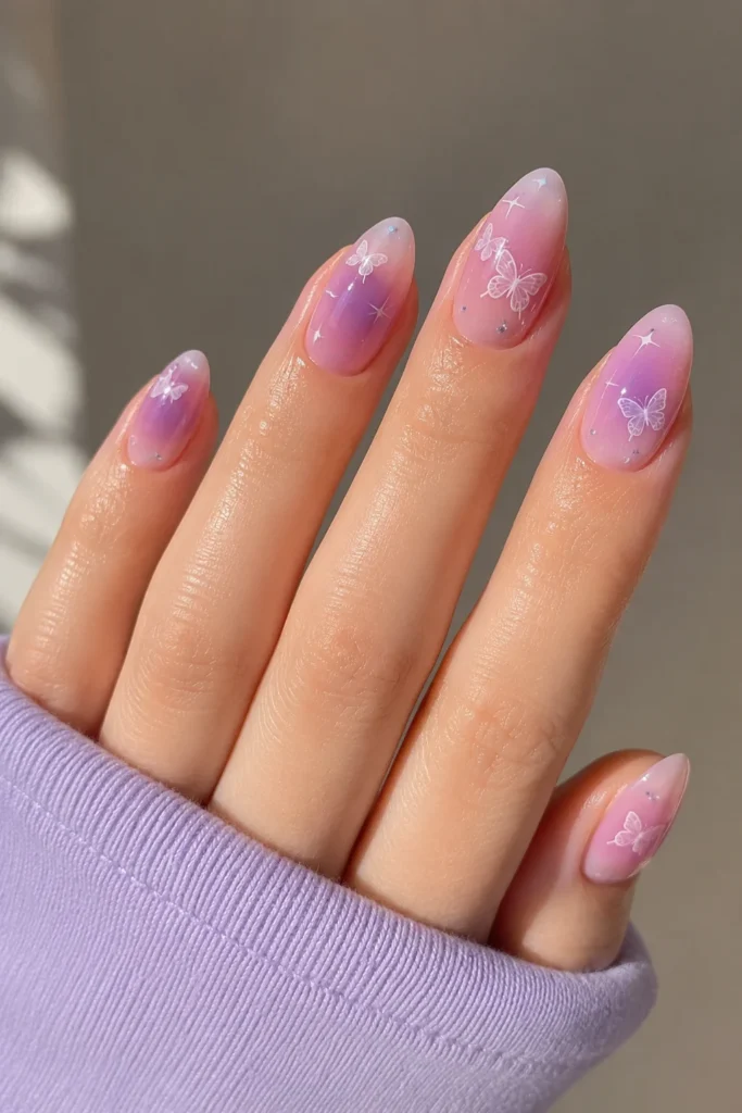dreamy aura background butterfly accent nail design