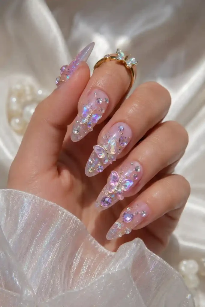 Butterfly charm nails mixed with sparkling gemstone rhinestone accents