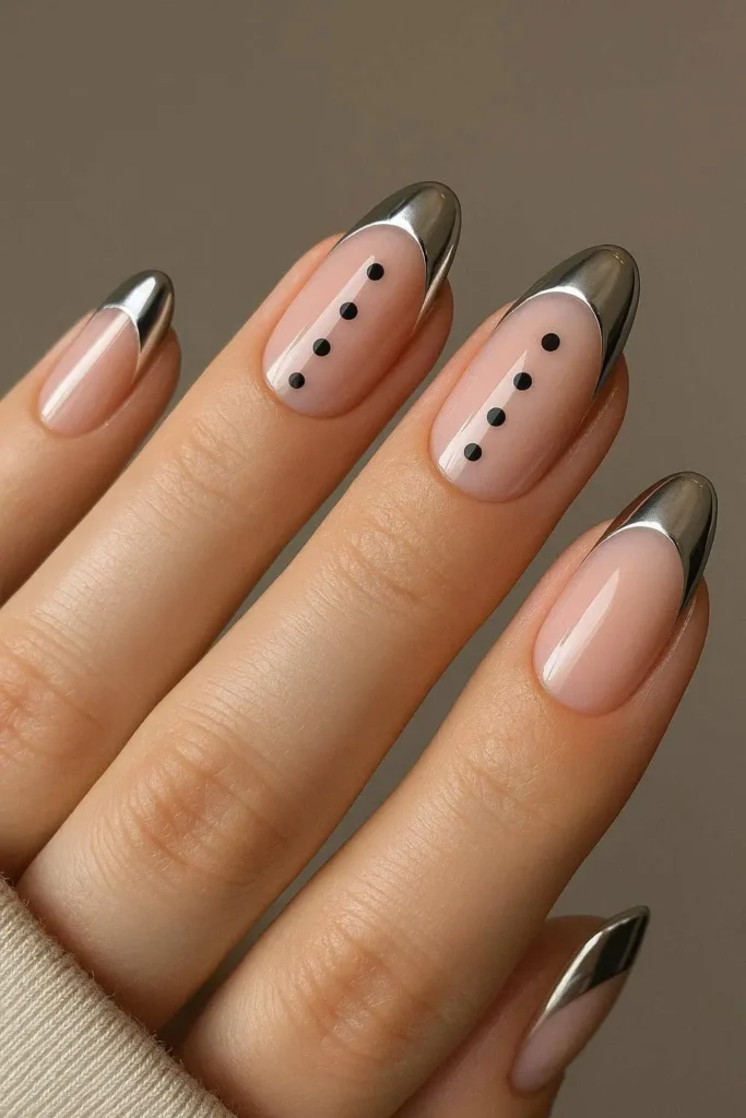 Chrome French tip nails with polka dot art