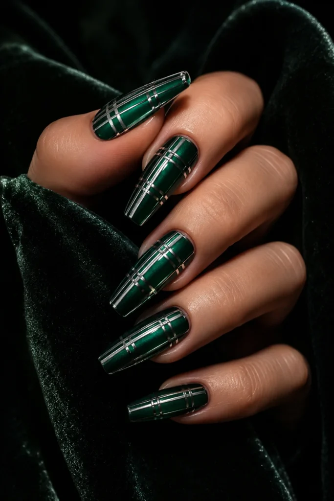 Chrome lined plaid nails with metallic silver over emerald polish