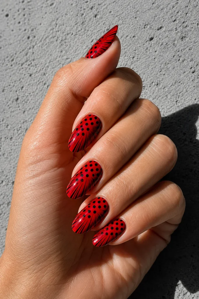 Comic pop art nails with black dots and bold graphic lines