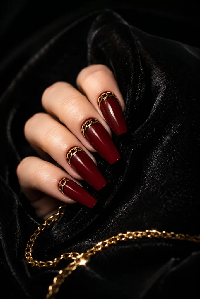 Deep red coffin nails with gold chain pattern