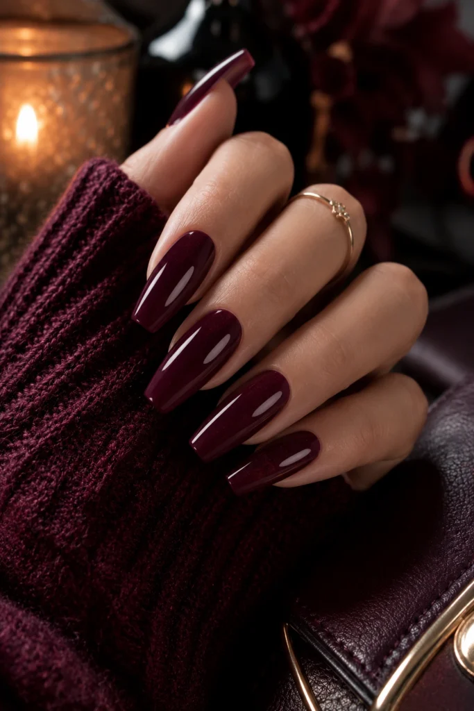 Deep berry dip powder nails for winter.