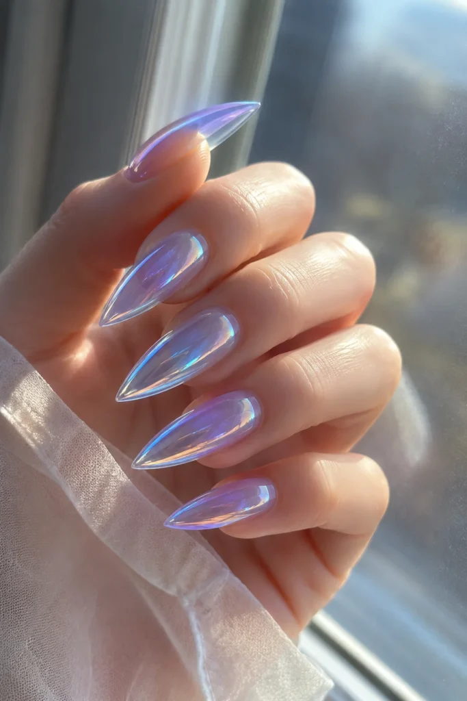 Translucent blue glass effect pointy nails with glossy finish