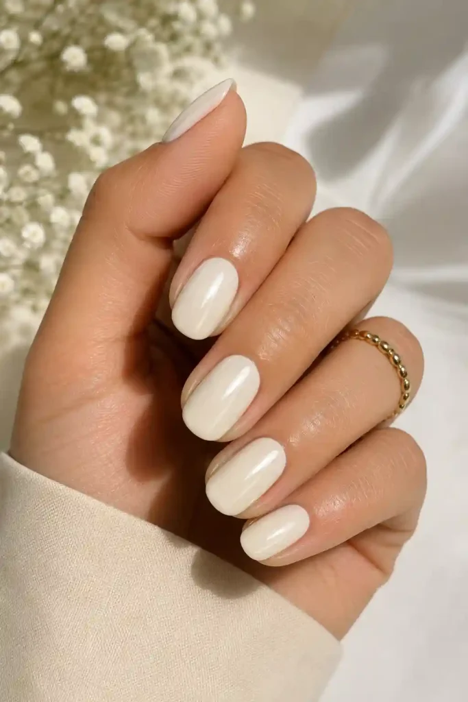 Polished glossy cream nails sophisticated and fresh for spring