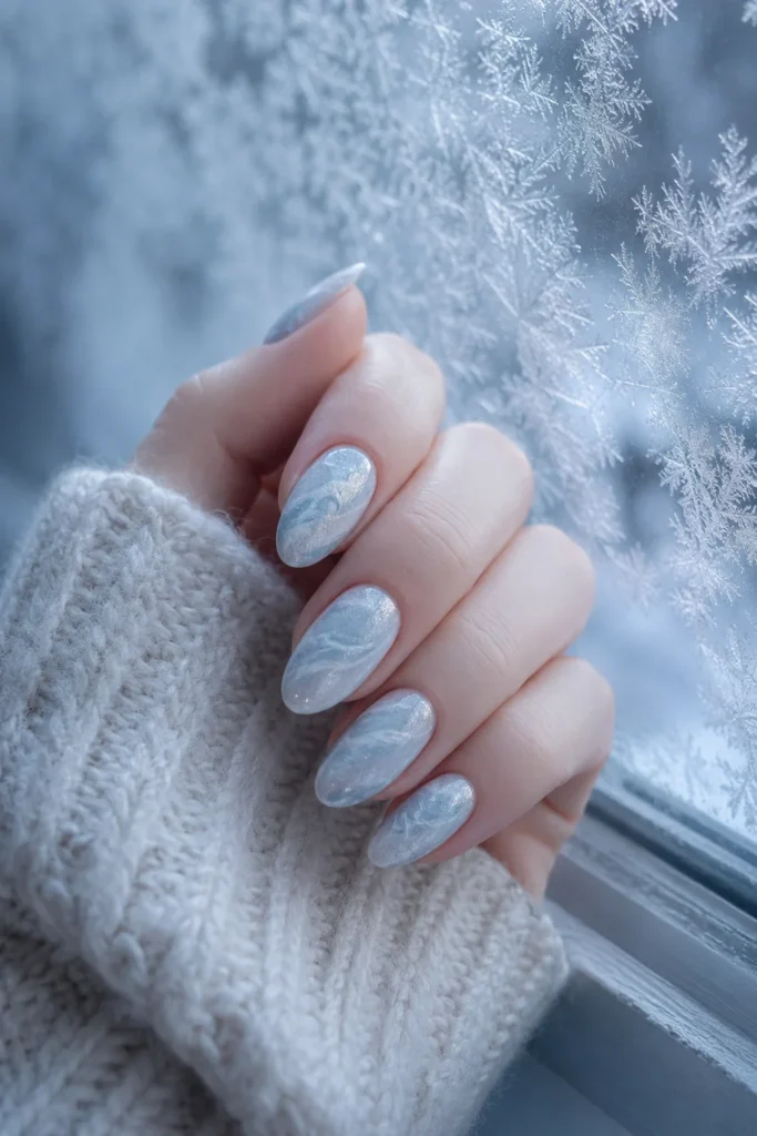 Icy blue winter marble nail design