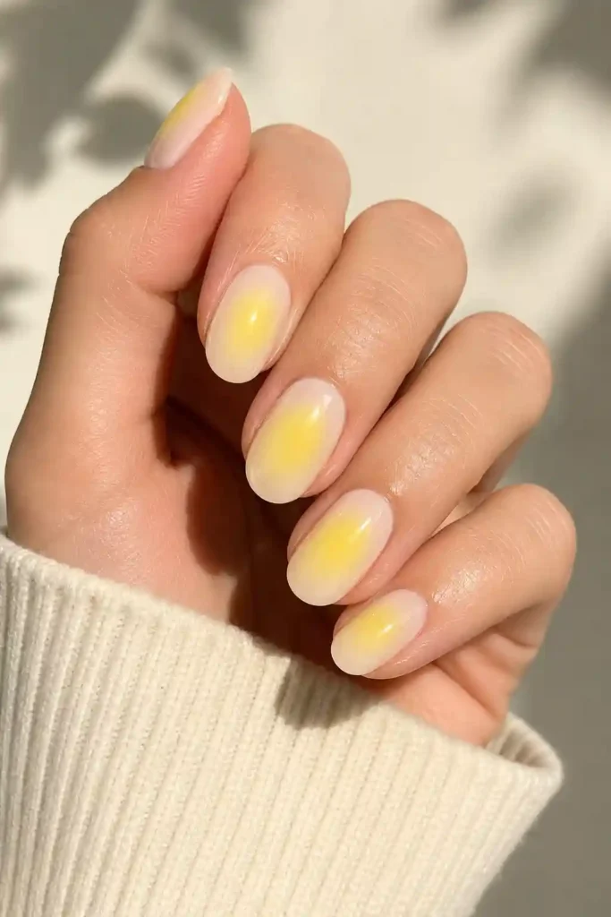 Soft lemon aura nails citrus yellow spring nail design