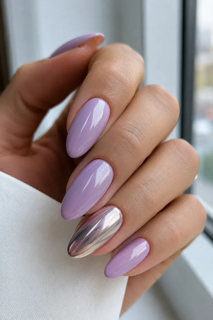 Soft lilac manicure with mirror chrome accent nail