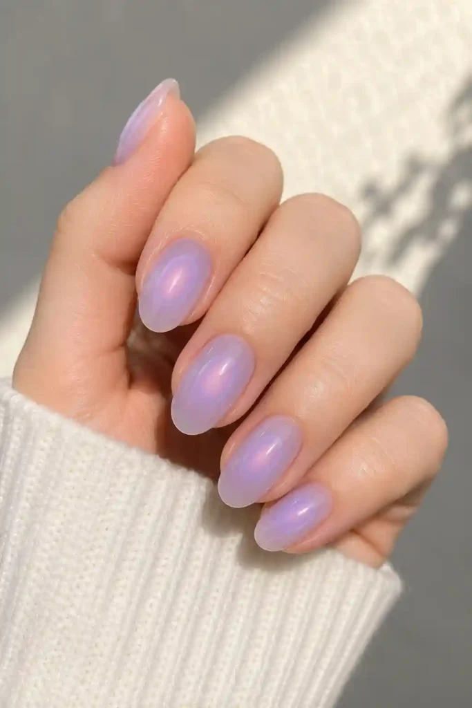Pastel lilac glow aura nails soft spring manicure