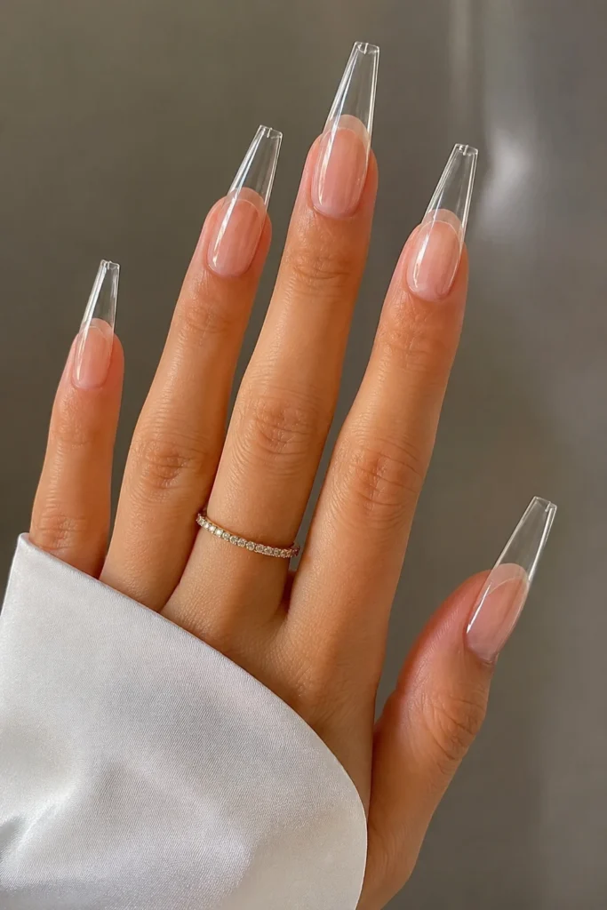 Long coffin shaped clear glossy nail manicure design