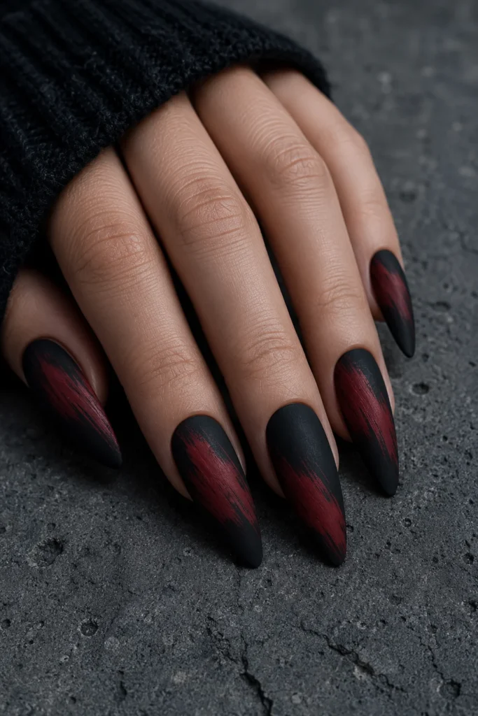 Matte textured brush finish nail design in black and red