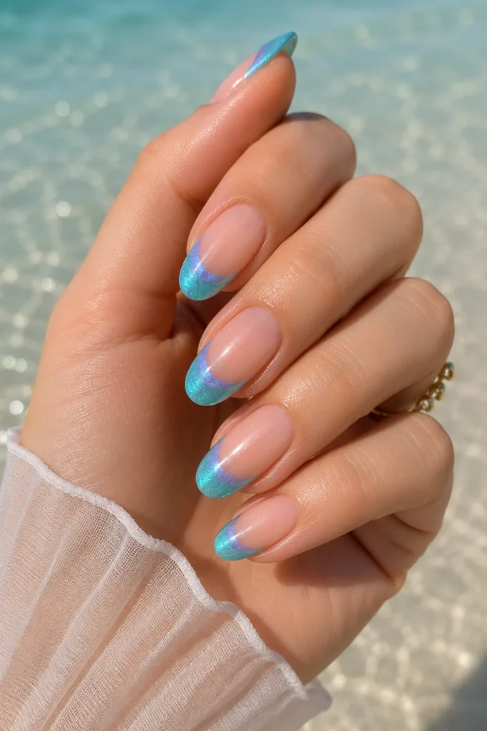 Shimmery blue teal mermaid french tip nails