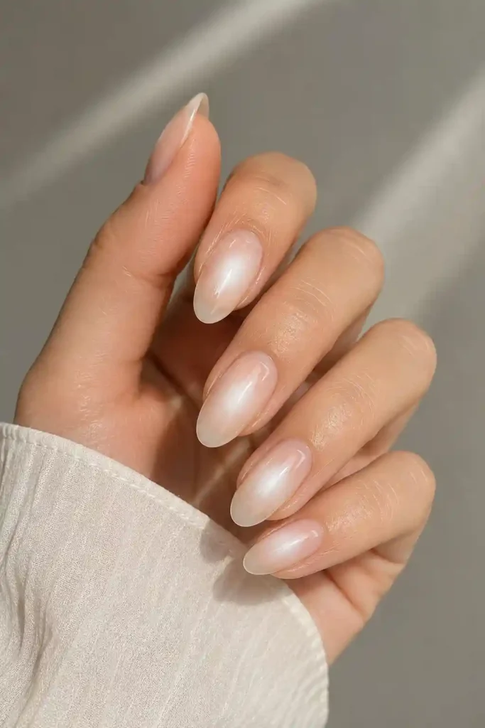 Milky white aura nails minimal glowing spring manicure