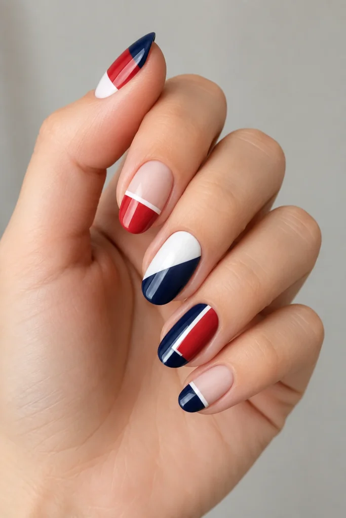 Geometric color block nails in red white navy