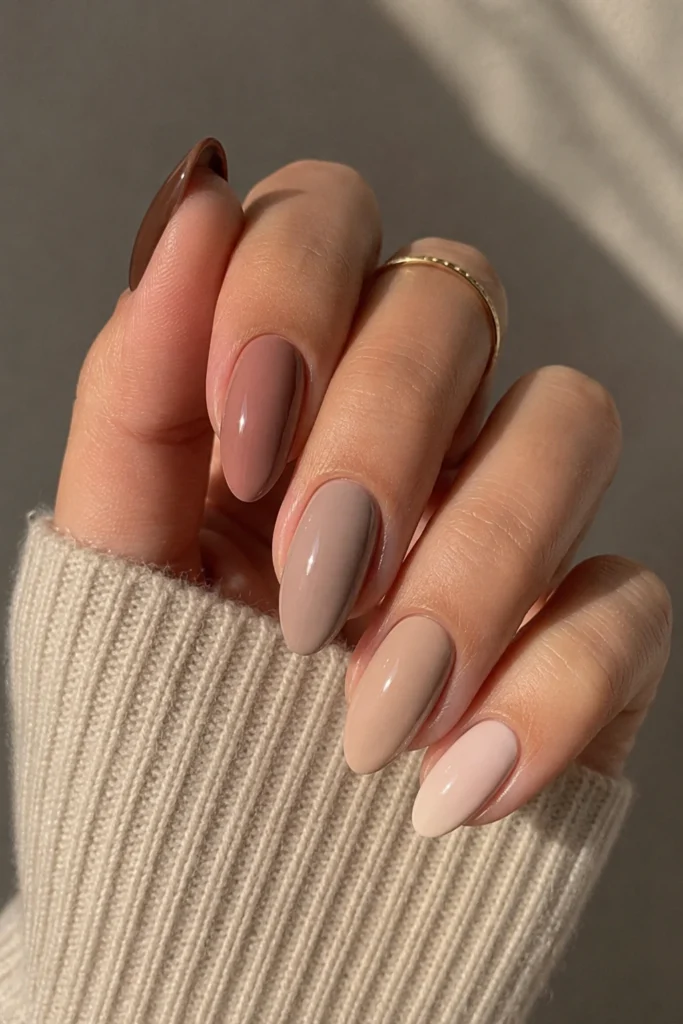 Neutral mixed tone nails modern layered manicure