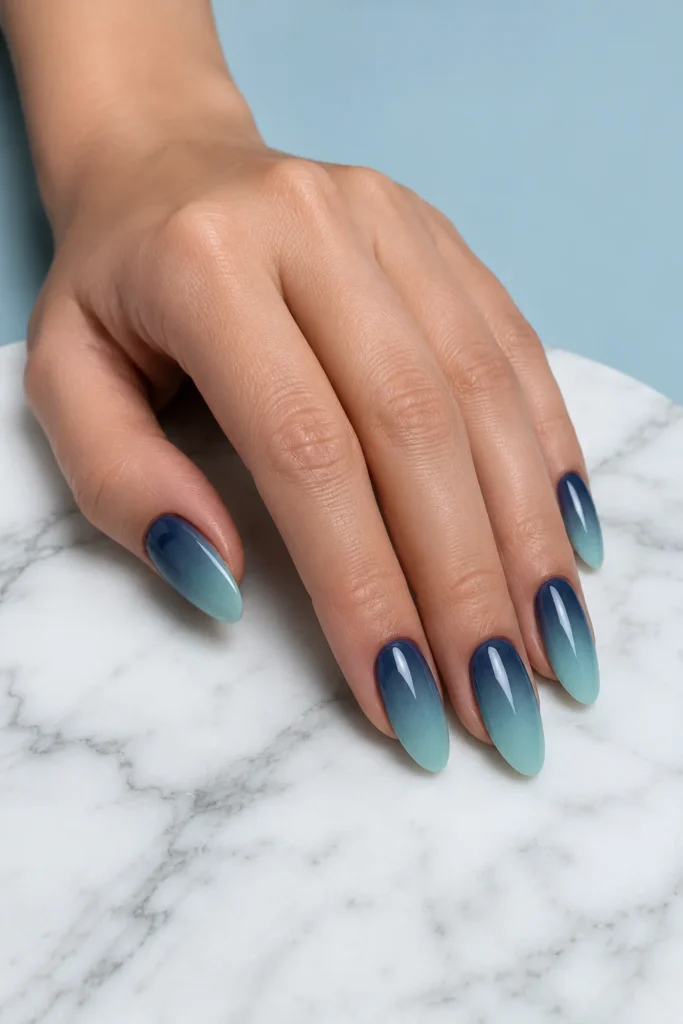 Ocean gradient ombré nails with smooth coastal color blend