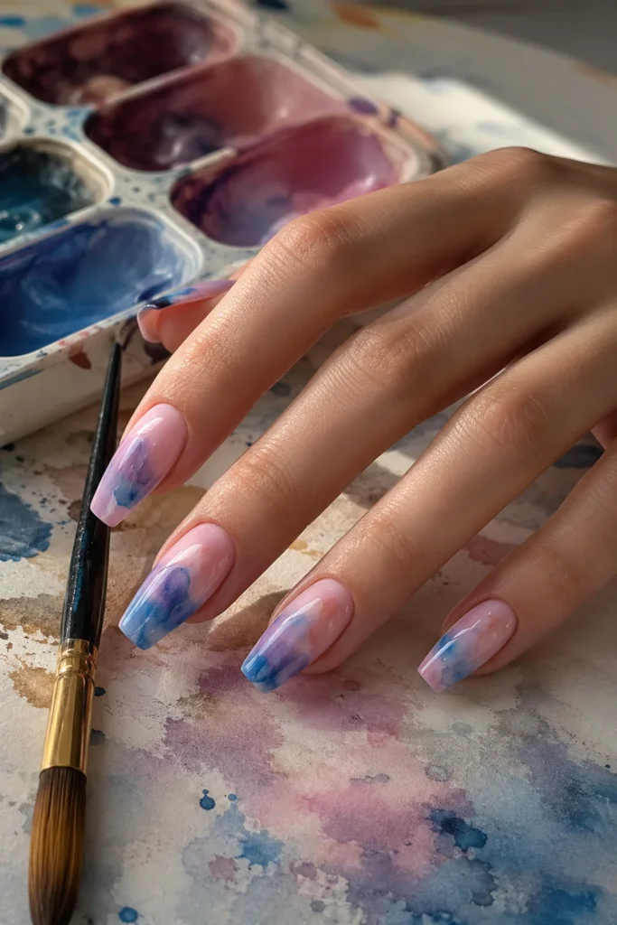Pink and blue watercolor effect nail art