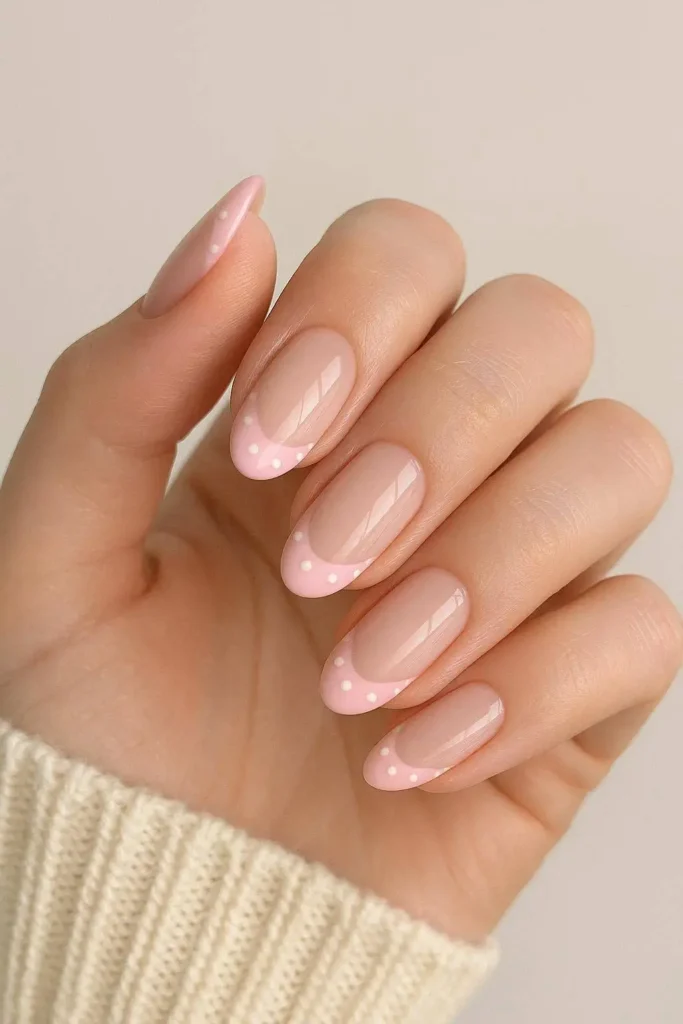 Pink French manicure with dainty dot details
