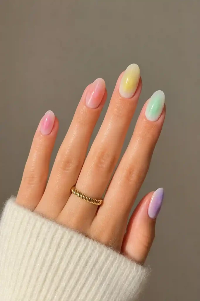 Rainbow pastel aura nails different shades each nail spring