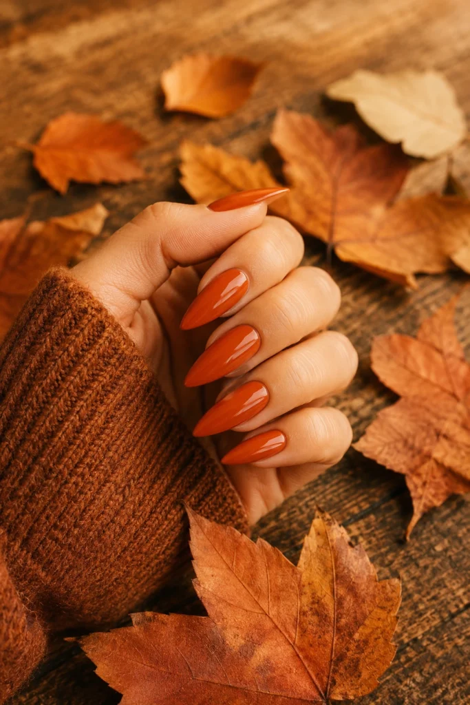Pointy nails in seasonal shades from spring coral to winter wine