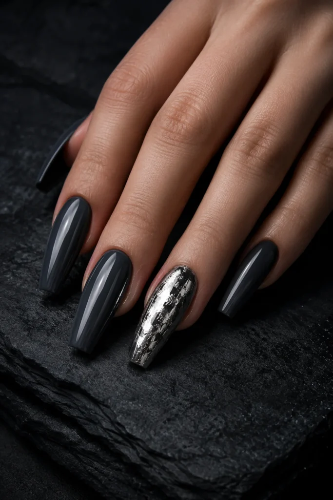 Dark ballerina nails with crinkled silver foil accent