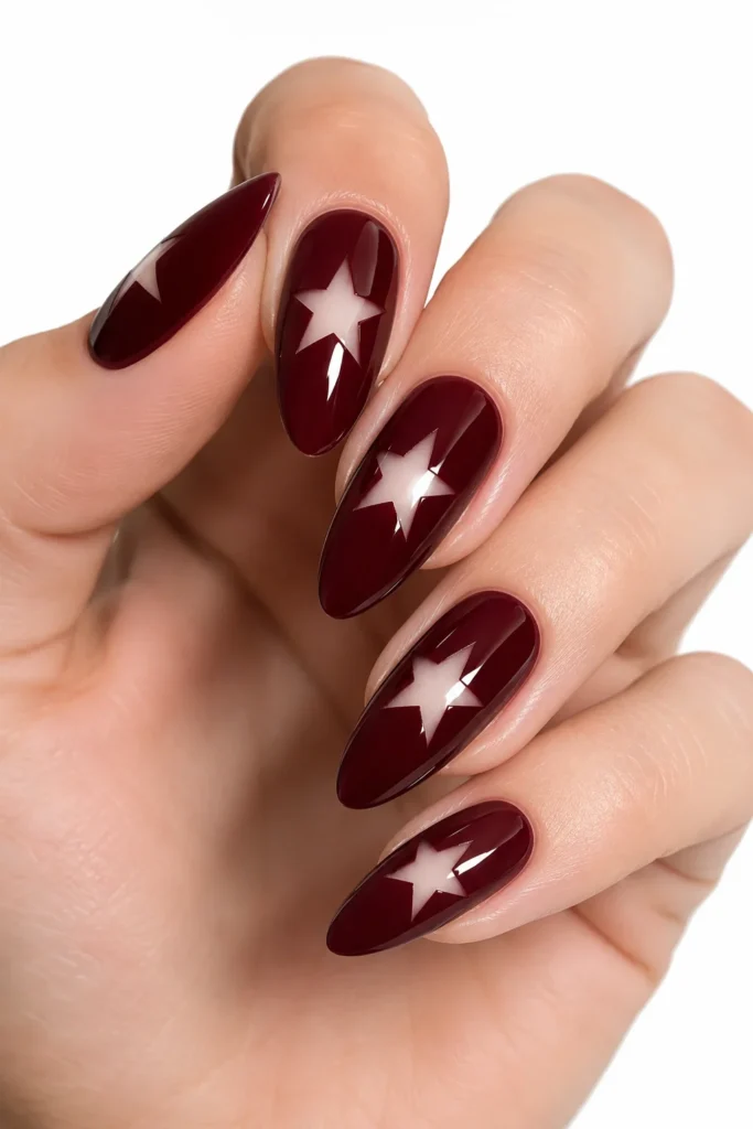 Negative space star cut-out nail design