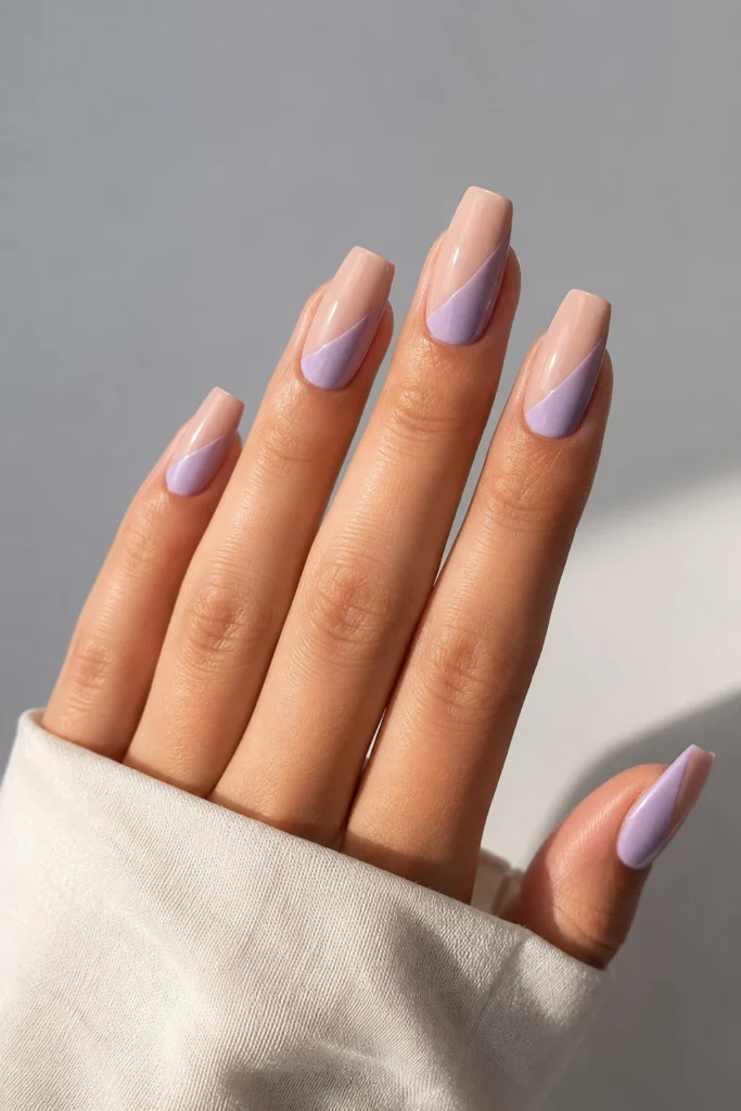 Nude and lavender split-color ballerina nails