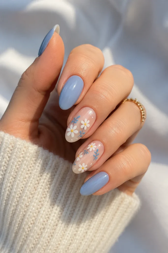 white daisies paired with soft blue nails