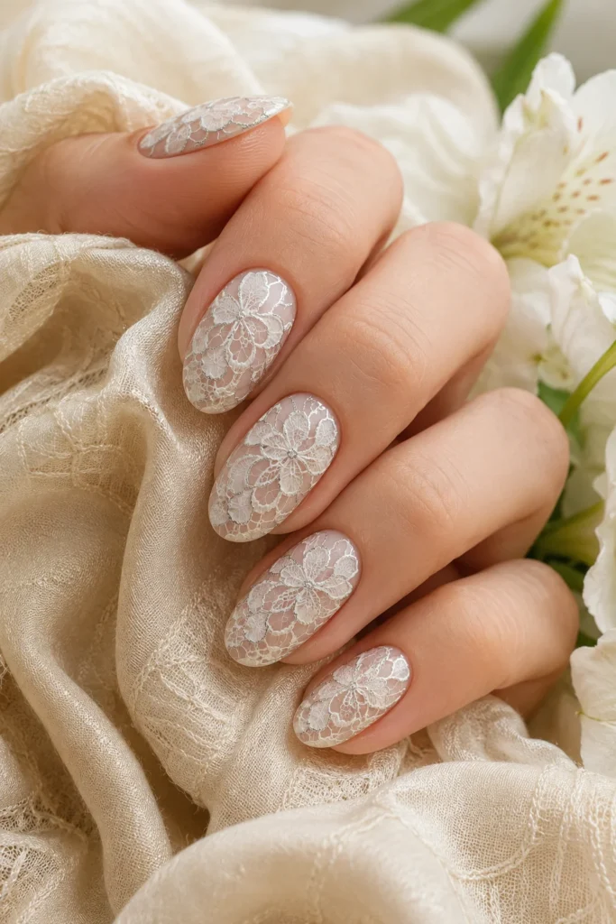 White lace nails with silver detailing