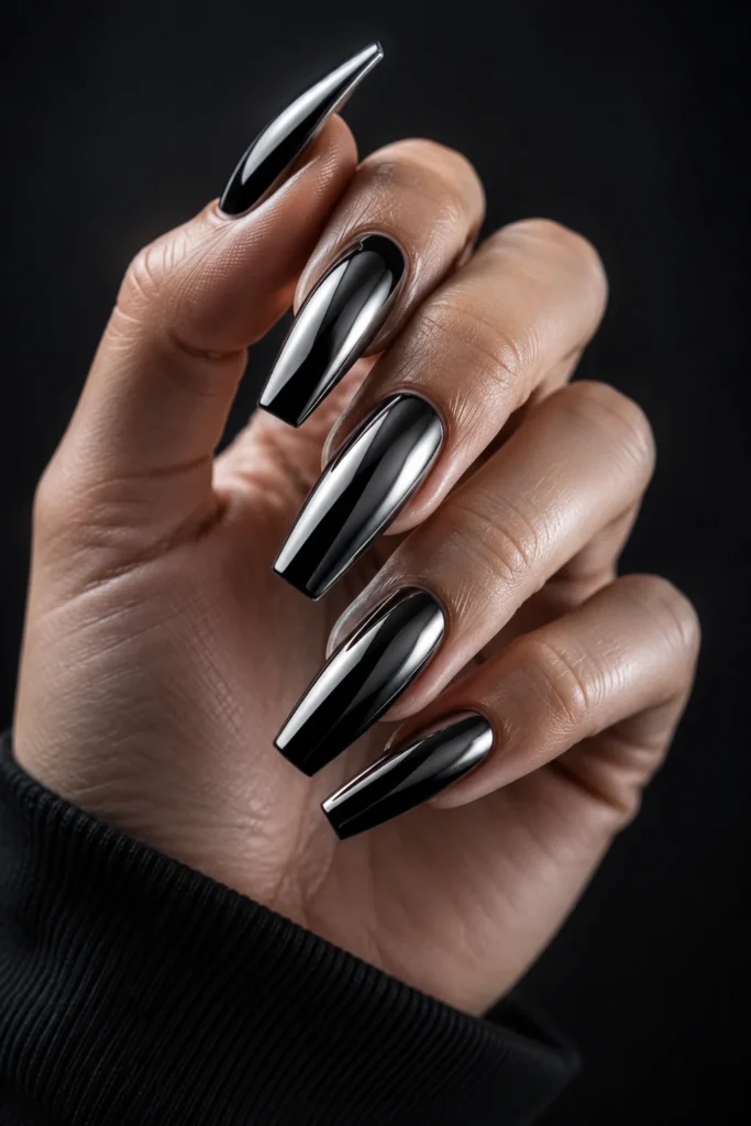 Mirror-like black chrome wedding nails on long almond-shaped nails