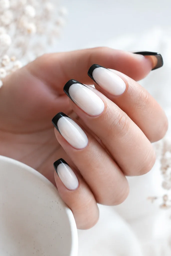 Black French tips with milky white base