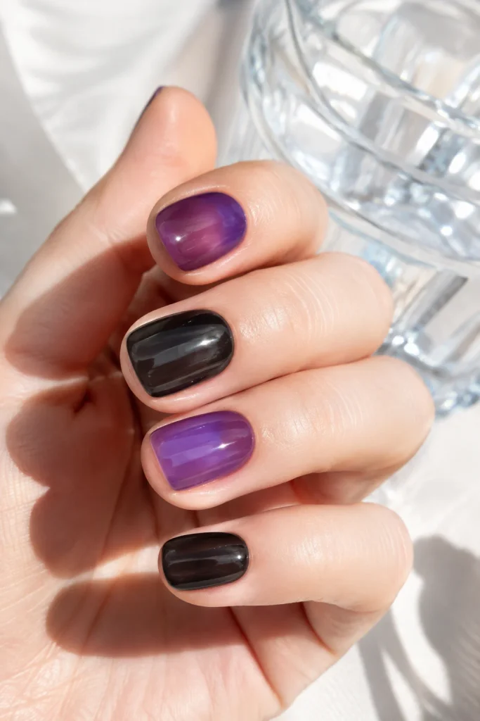 Purple and Black Nail Ideas featuring sheer purple and black jelly nails