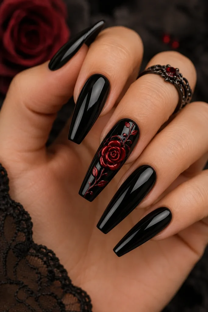Glossy black coffin nails with red gothic rose accent nail
