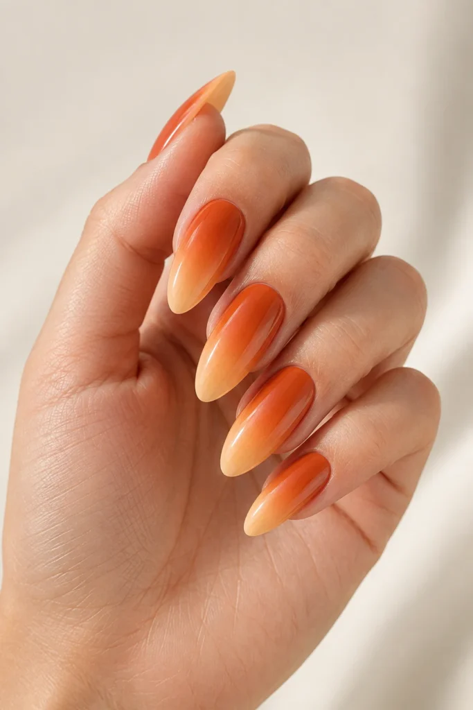 Burnt orange ombre almond nails inspired by fall leaves