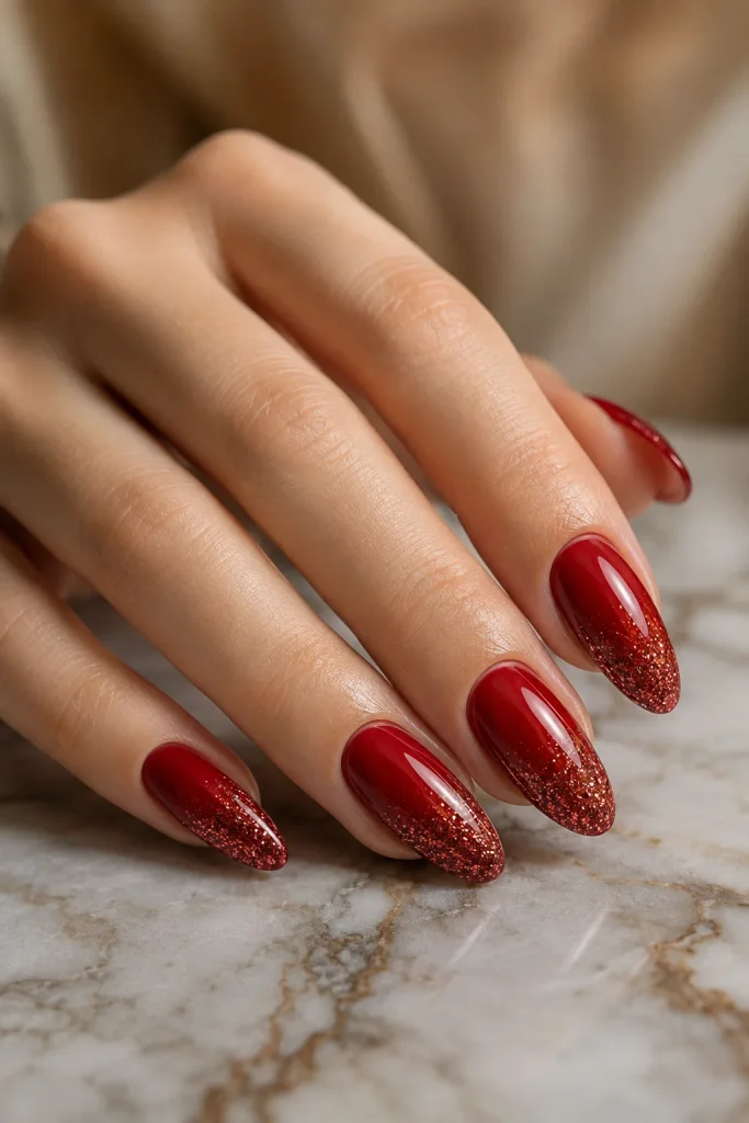Classic red glitter ombre nails with sparkling tips