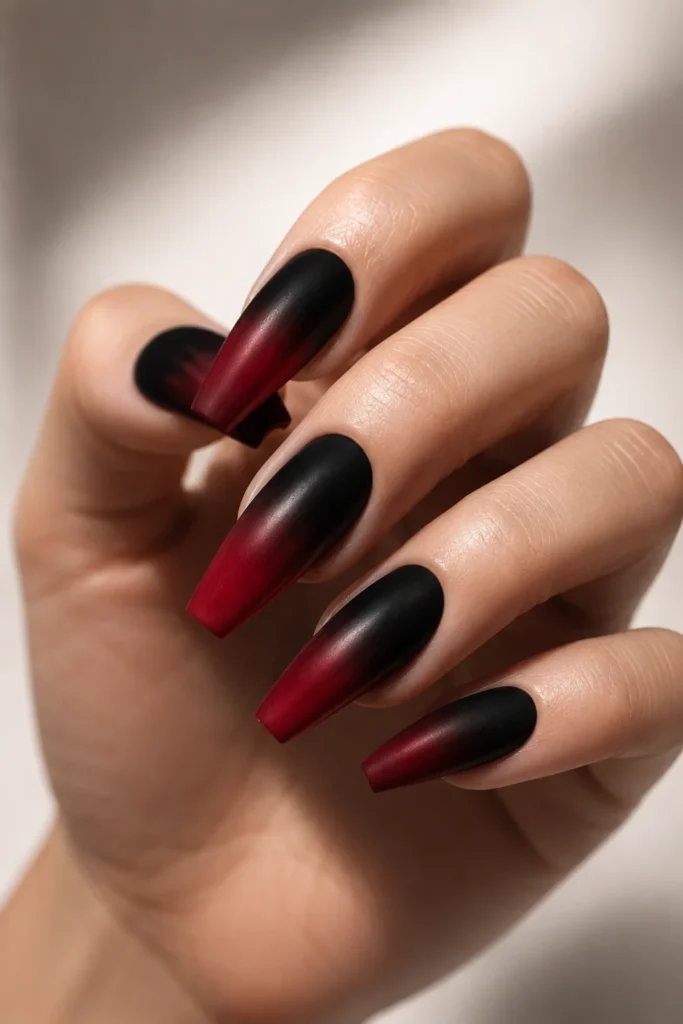 Dark red ombre coffin nails blending black into deep red