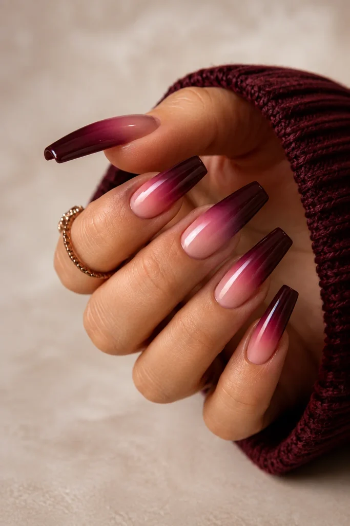 Deep berry to soft pink ombre nails